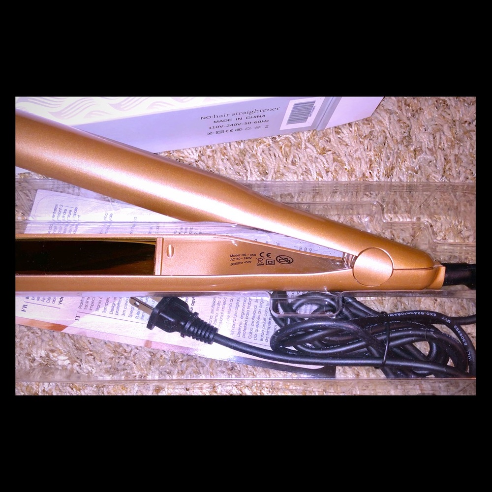 Hair straightener and curler.
